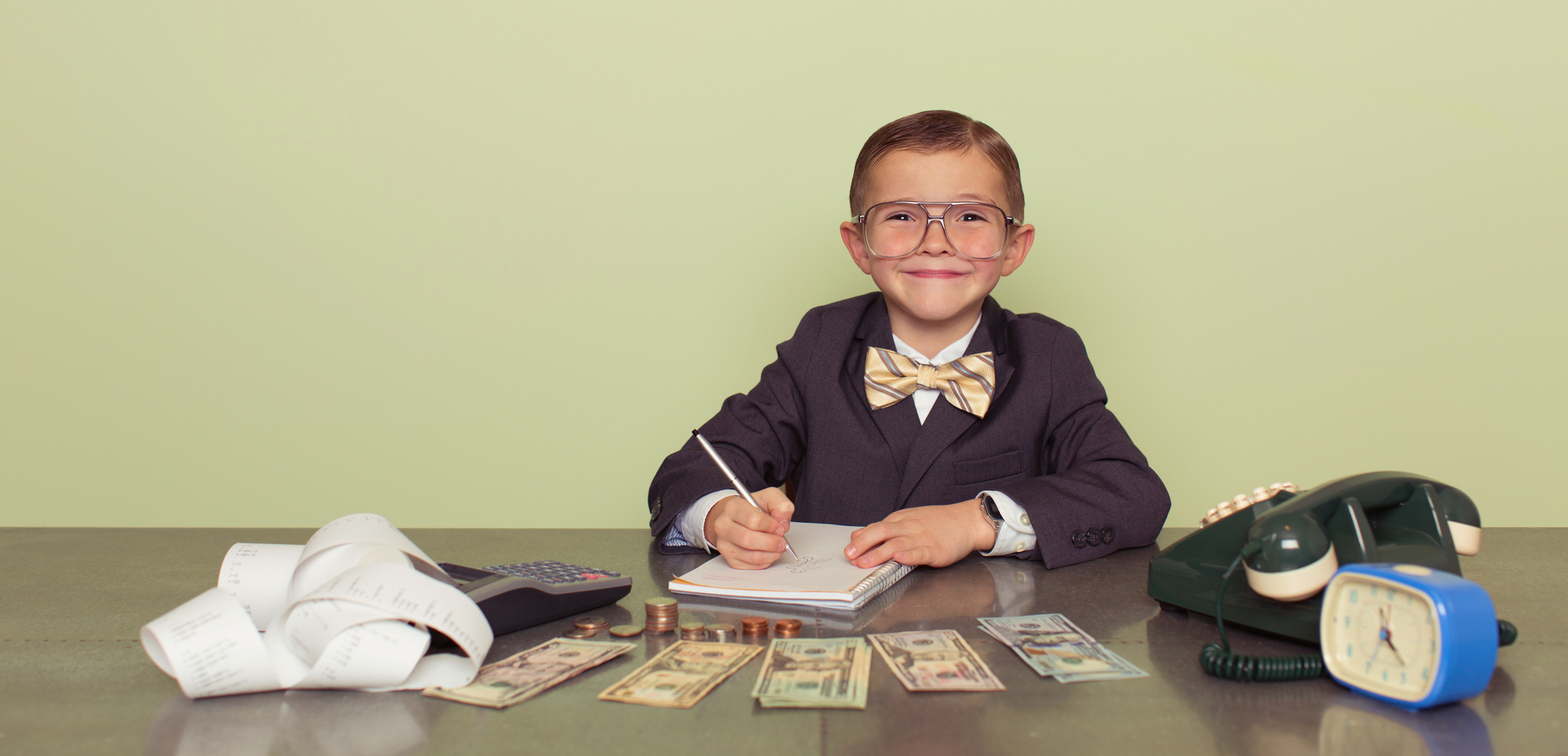 Content Marketing Salary: Young Boy Counting money